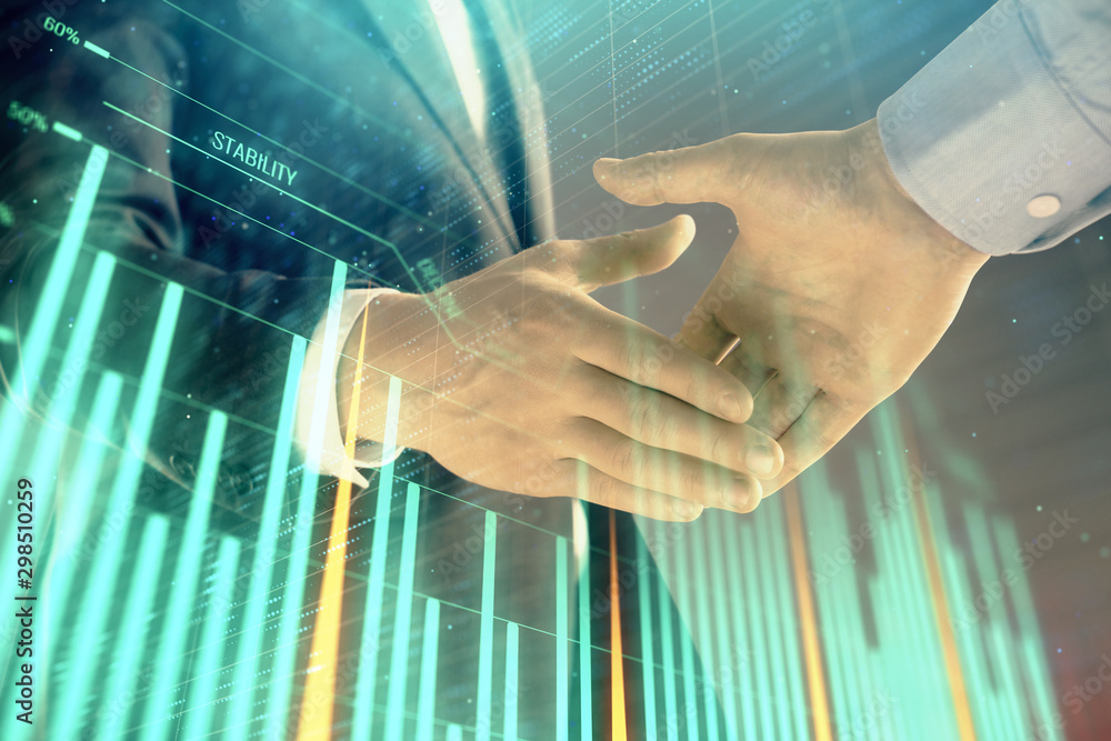 Multi exposure of forex graph on abstract background with two businessmen handshake. Concept of success on stock market Multi exposure of forex graph on abstract background with two businessmen handshake. Concept of success on stock market