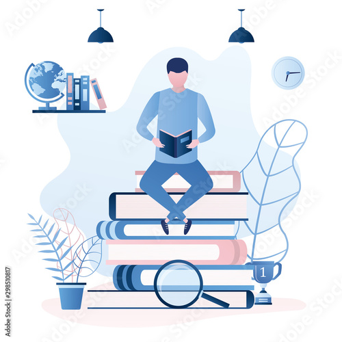 Handsome man student sitting on pile of books. Male character reading book or textbook. Education or learning concept.