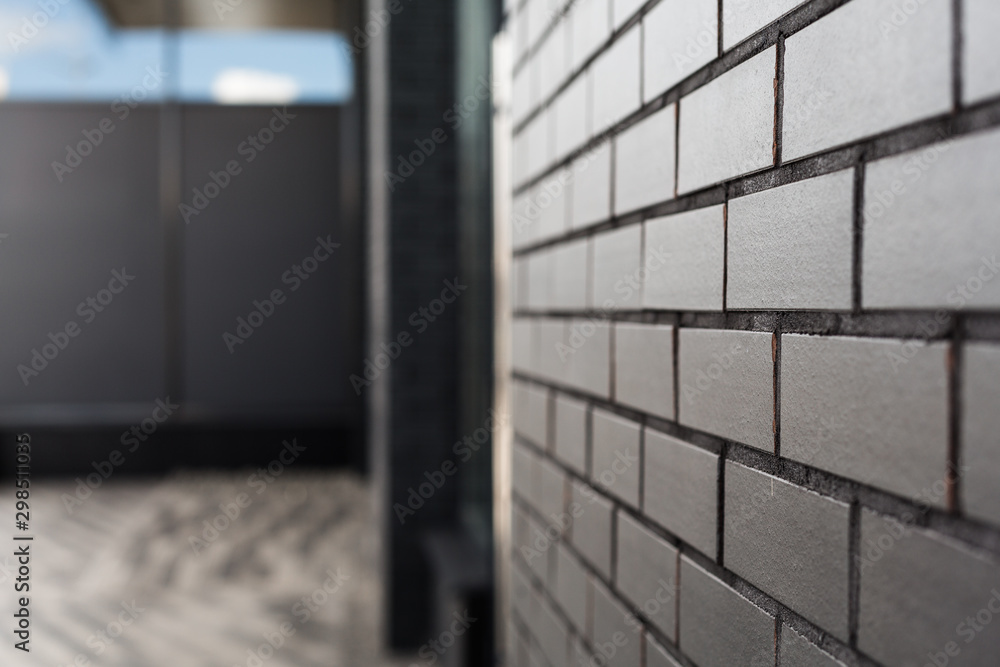 Dark brick wall with blured background. copy space