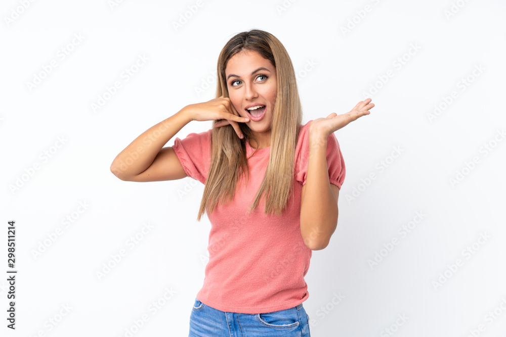 Young blonde woman over isolated white background making phone gesture and doubting Young blonde woman over isolated white background making phone gesture and doubting
