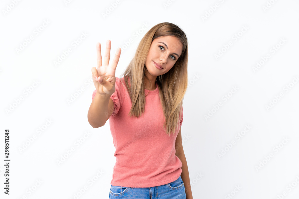 Young blonde woman over isolated white background happy and counting three with fingers Young blonde woman over isolated white background happy and counting three with fingers
