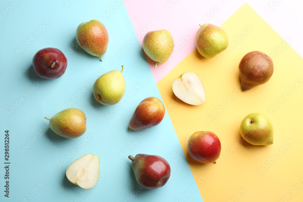 Ripe juicy pears on color background, flat lay Ripe juicy pears on color background, flat lay