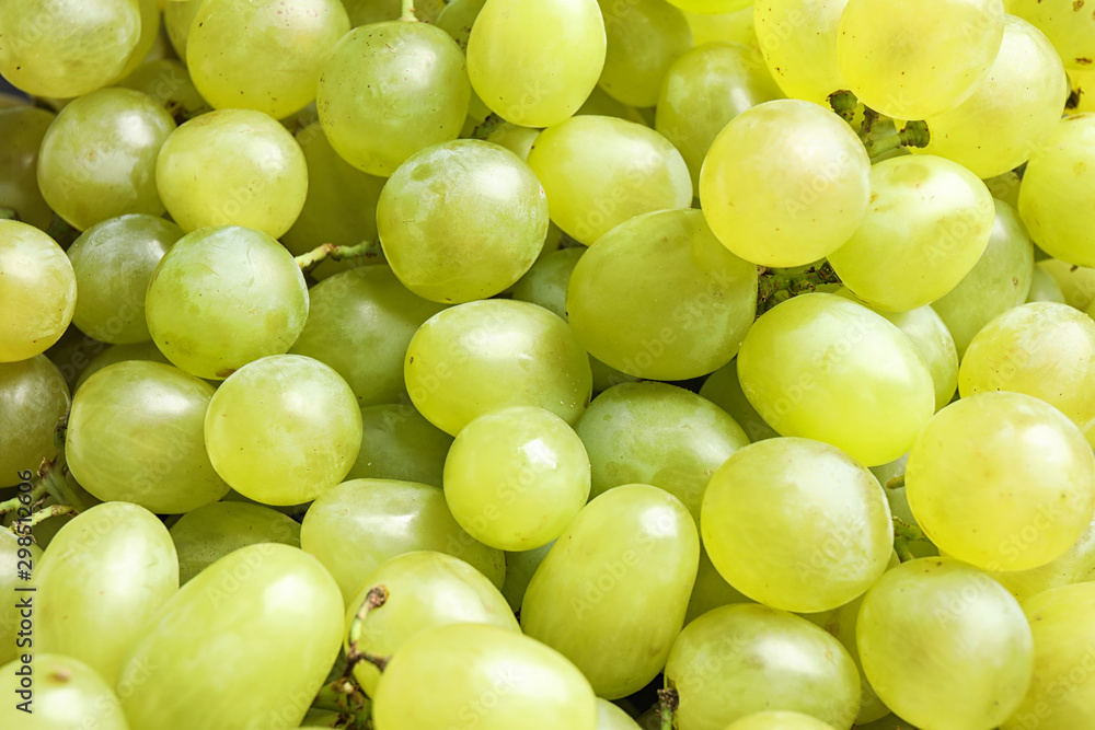 Fresh ripe juicy white grapes as background, closeup view Fresh ripe juicy white grapes as background, closeup view