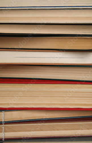 Stack of hardcover books as background  closeup