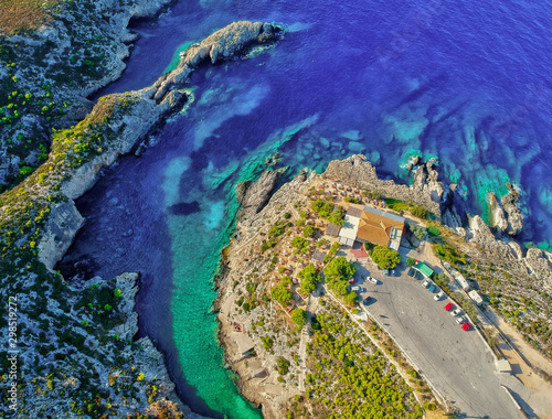 Aerial view of Porto Limnionas beach in Zakynthos (Zante) island Greece. Blue lagoon bay in Zakynthos Porto Limnionas beach. Blue sea making its way through the rocks.