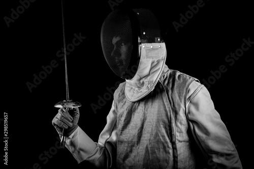 Fotografija Young man in fencing gear