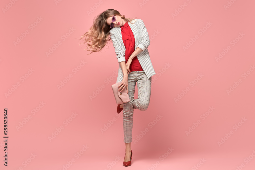Fashion. Beautiful woman in autumn jacket, trendy hairstyle, make up dance. Adorable well dressed blonde girl on pink. Gorgeous fashionable lady in red, hairstyle, makeup. Creative beauty shot Fashion. Beautiful woman in autumn jacket, trendy hairstyle, make up dance. Adorable well dressed blonde girl on pink. Gorgeous fashionable lady in red, hairstyle, makeup. Creative beauty shot