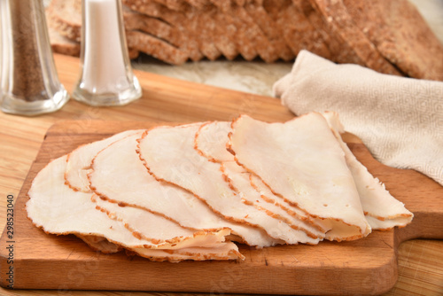 Sliced turkey and sprouted bread
