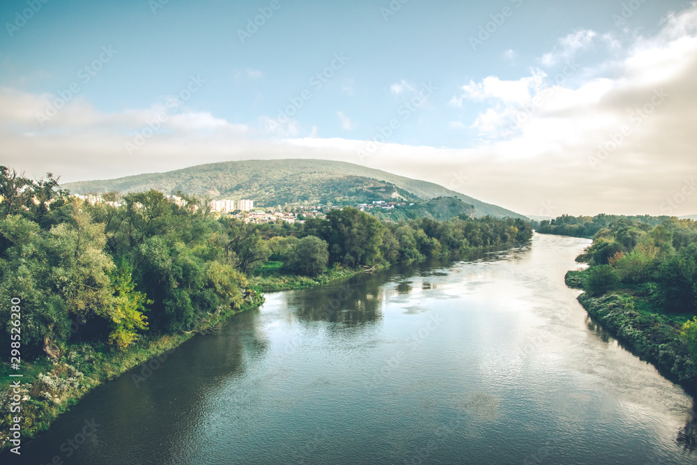 Autumn Morava river and riverside during the sunset. Photo taken from the bridge between Slovakia and Austria. 