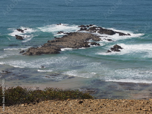 Beach near Aljezur in Portugal at the coast Vicentina, where the fishermens trail starts. photo