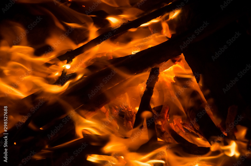 Fototapeta premium Detail of a bonfire lit at night