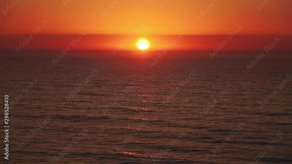 Dramatic ocean horizon red sunset 