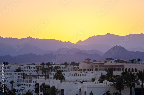 Resort hotels against the backdrop of the mountains during sunset, Sharm El Sheikh, Egypt photo