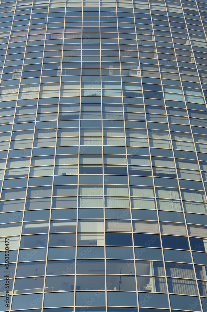 Modern architectural background of the glass facade of the building Modern architectural background of the glass facade of the building