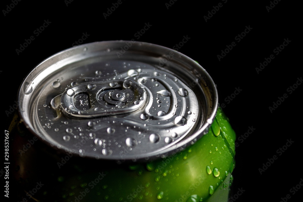 aluminum soda and beer beverage can with water droplets isolated on dark background, metal can, recyclable product aluminum soda and beer beverage can with water droplets isolated on dark background, metal can, recyclable product