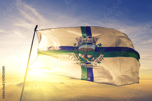 Bild auf Leinwand Resende of Brazil flag waving on the top sunrise mist fog