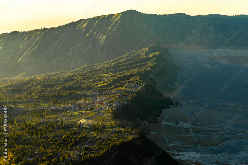Φωτογραφία The village near the Bromo vocano group is covered with beautiful fog in the morning