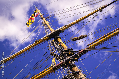 Mast, rigging and flags of a classic sailing ship.