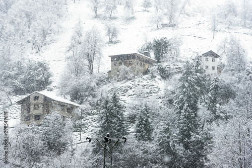 Rize Houses under blizzard in winter.