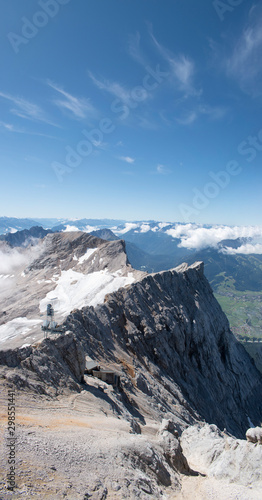 Jagged peaks of mountain with summer snow