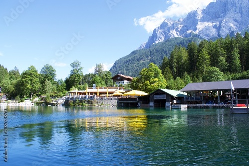 View of Eibsee is a lake in Bavaria, Germany, with buildings on the bank