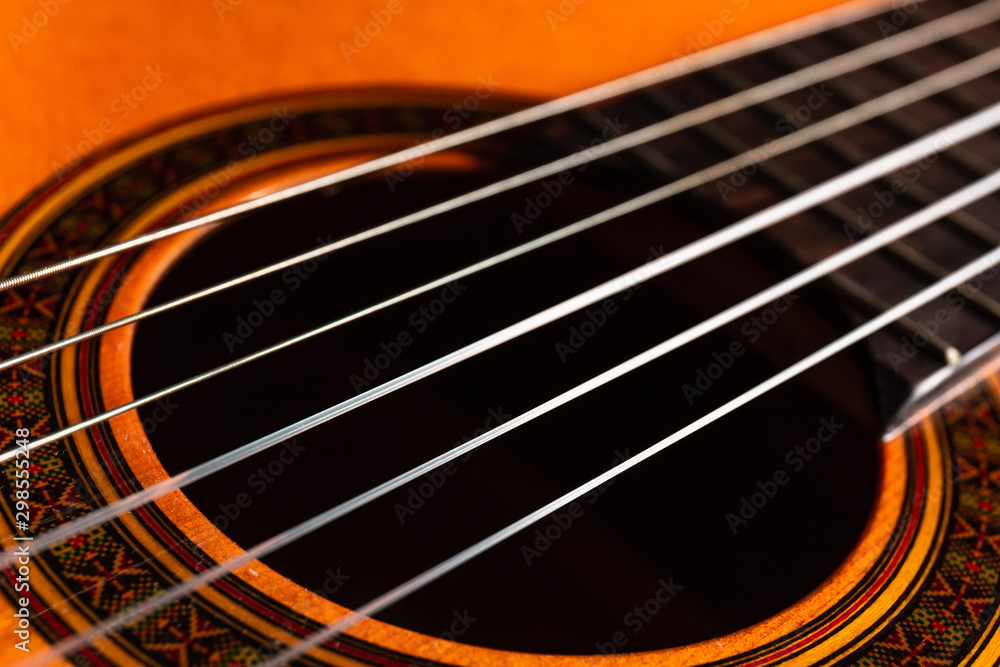 Shot of Classical Guitar Strings on a Rustic Wooden Table Shot of Classical Guitar Strings on a Rustic Wooden Table