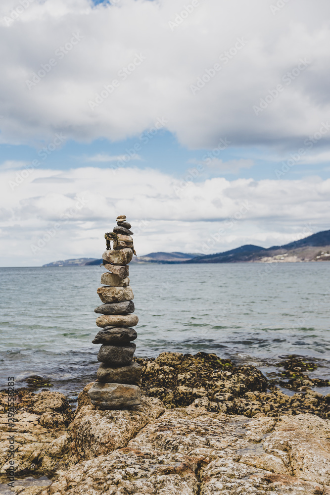 pebbles and rocks in relaxing zen inspiring stack on the beach in Australia