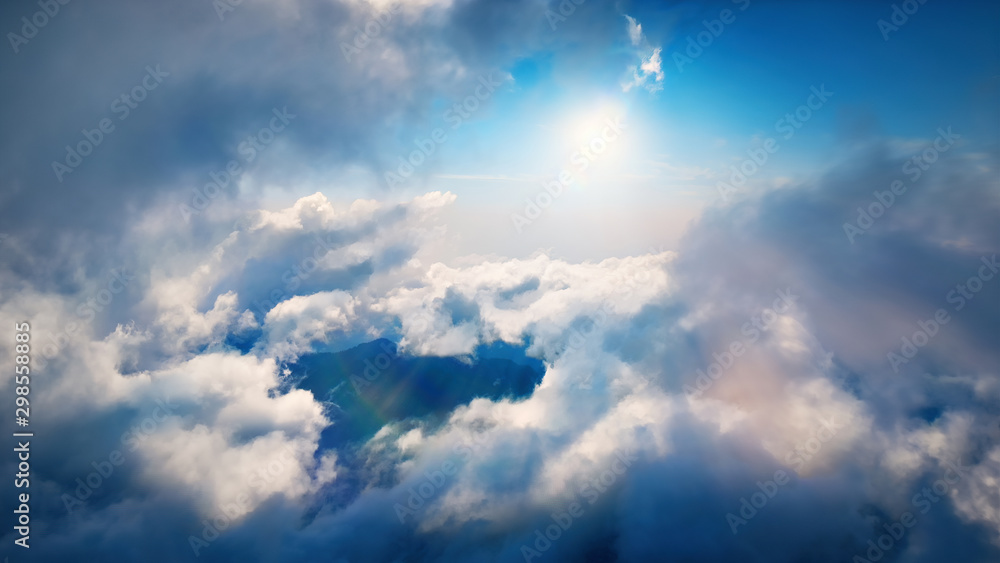 Flying through heavenly beautiful sunny cloudscape. Amazing of white ...