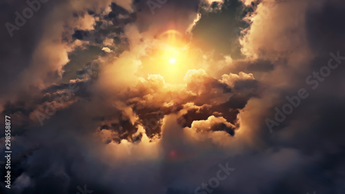 Flying through picturesque sunny cloudscape. Amazing of soft golden clouds moving in pure sunshine and the sun glowing through the clouds with beautiful rays and lens flare. © railwayfx