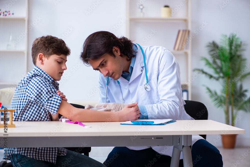 Obraz premium Boy in blood tranfusion concept