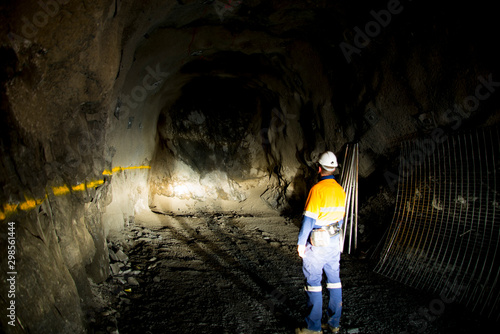 Underground Geologist in Mining Tunnel