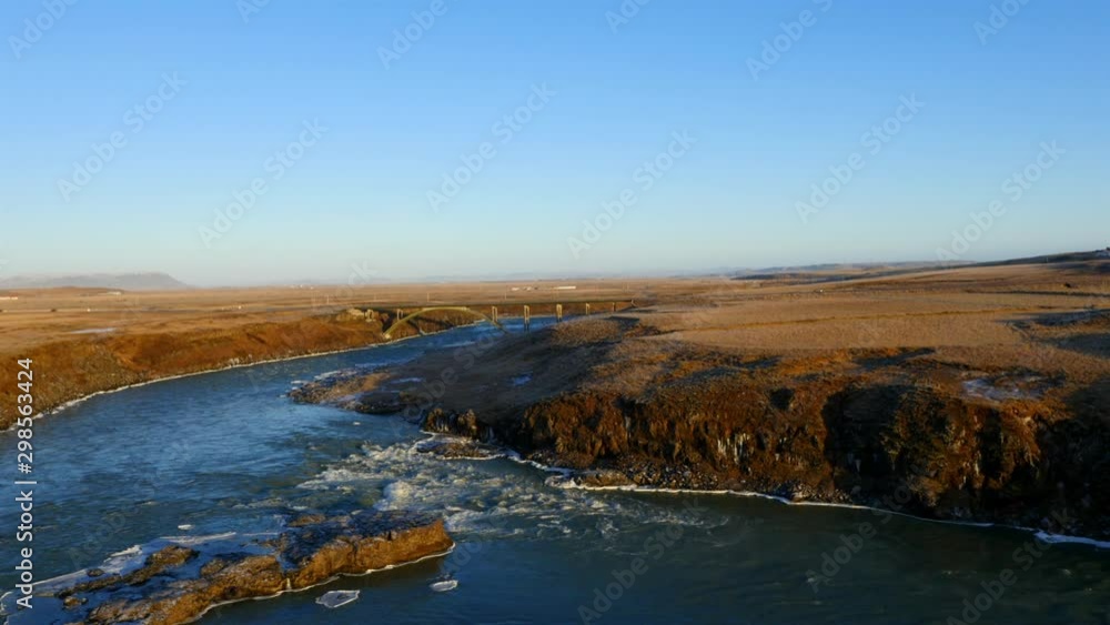 Aerial view of frozen Urriðafoss waterfall in Iceland with wild river Aerial view of frozen Urriðafoss waterfall in Iceland with wild river