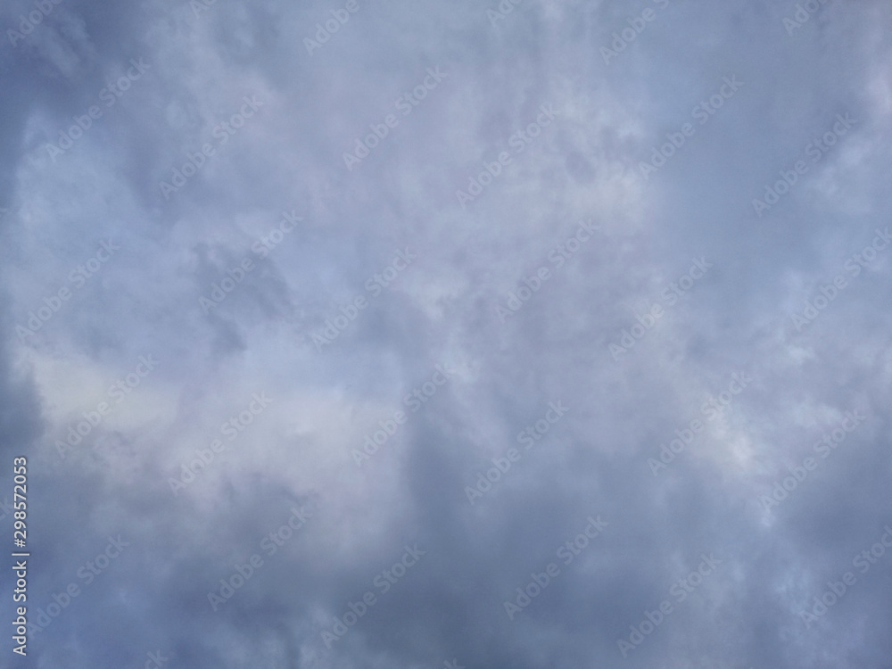 The sky is cloudy, rain is falling. A stratocumulus cloud belongs to a genus-type of clouds characterized by large dark. The sky is cloudy, rain is falling. A stratocumulus cloud belongs to a genus-type of clouds characterized by large dark.