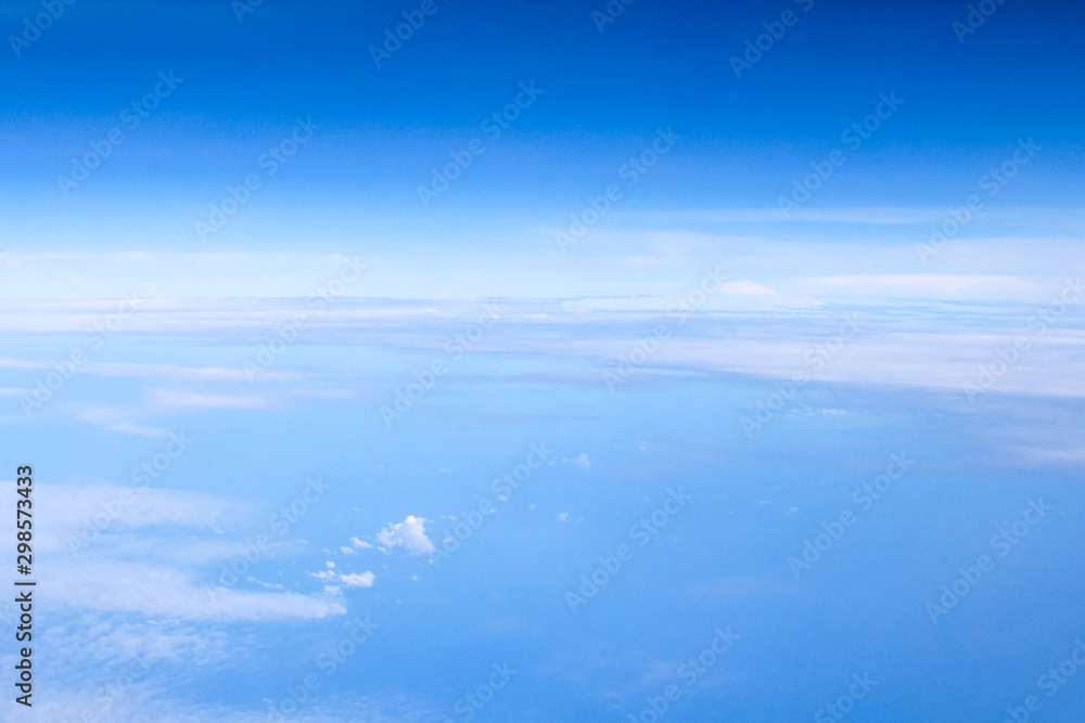 Beautiful of cloud on blue sky background at the winter season.Top view in airplane. Beautiful of cloud on blue sky background at the winter season.Top view in airplane.