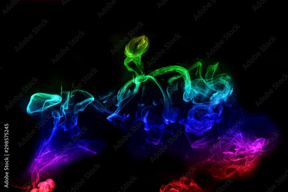 Fototapeta premium Abstract smoke isolated on black background,Rainbow powder