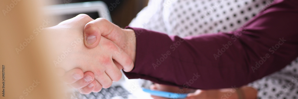 Fototapeta premium Man in suit shake hand as hello in office