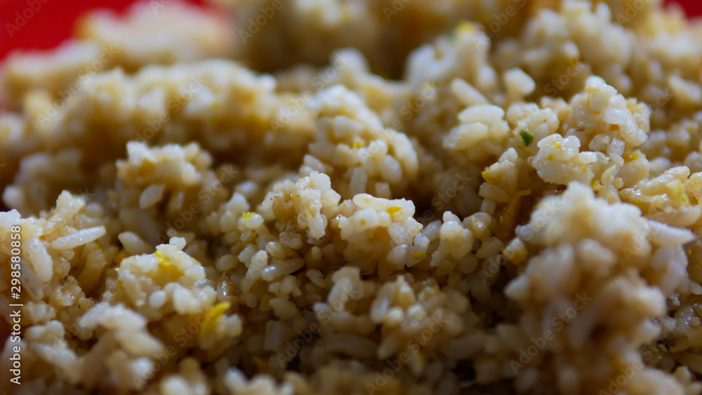 This is fried rice on a plate This is fried rice on a plate