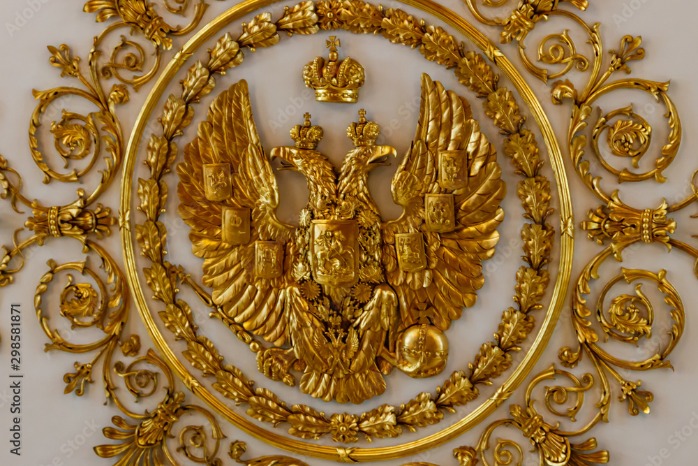 Golden double-headed eagle - the coat of arms of Russian Empire and Russian Federation