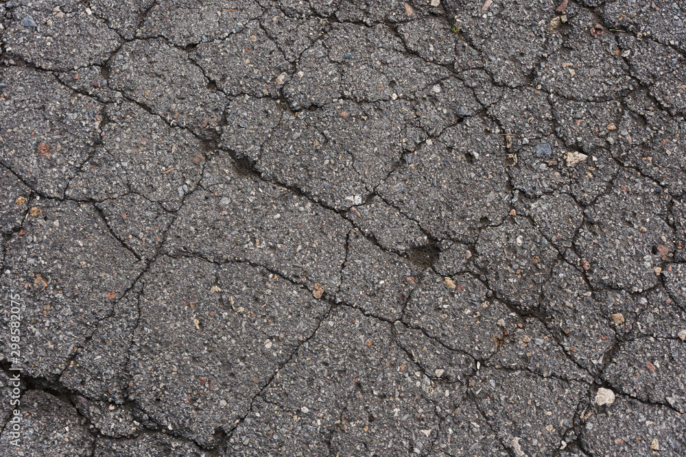 Fototapeta premium old broken cracked asphalt texture background