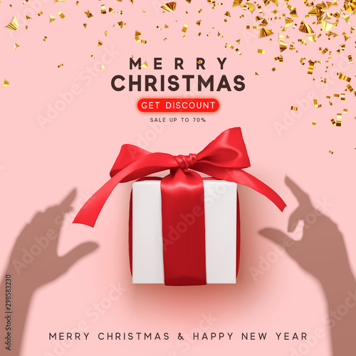 Merry Christmas and Happy New Year. Background with realistic gift box. Silhouette shadow from the hands holds Xmas presents. Creative getting card, holiday banner.