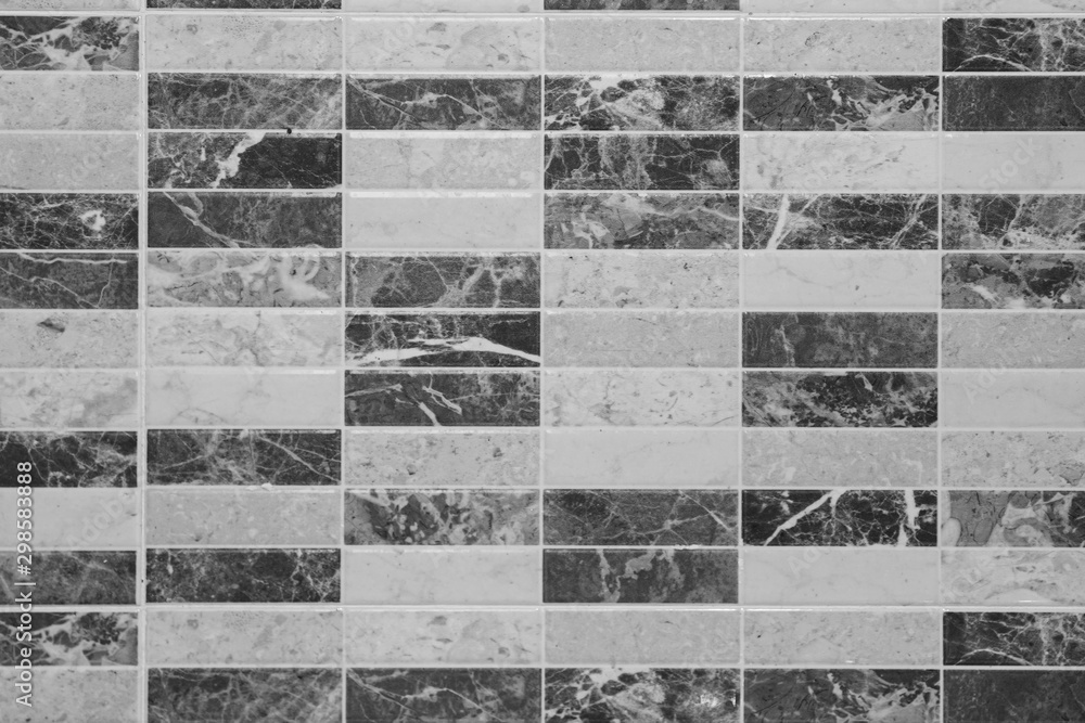 Black and white wall tile modern decorative natural mosaic for inside. Panel wall small marble brick background texture.