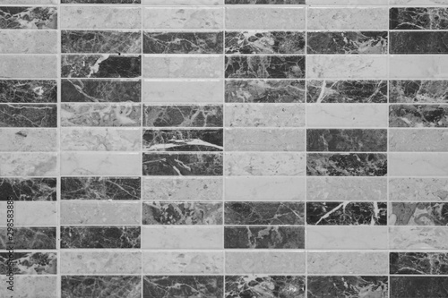 Black and white wall tile modern decorative natural mosaic for inside. Panel wall small marble brick background texture.