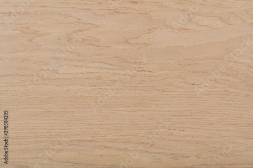 Beautiful oak veneer background in elegant beige color. High quality wood texture.