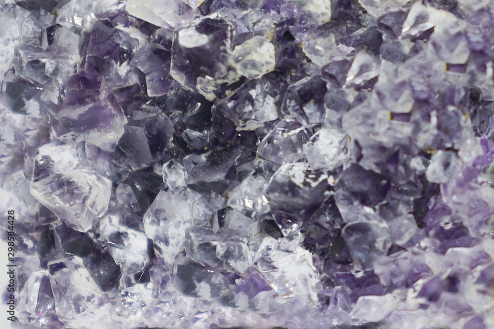 Background made of mineral. Purple amethyst crystal surface Background made of mineral. Purple amethyst crystal surface