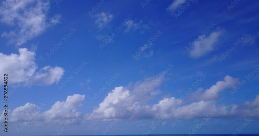 Fluffy clouds on a beautiful sunny day and blue sky on the horizon of Australia - Steady shot Fluffy clouds on a beautiful sunny day and blue sky on the horizon of Australia - Steady shot
