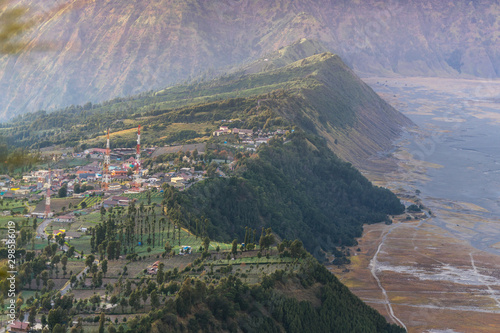 The village near the Bromo group is covered with beautiful fog in the morning.