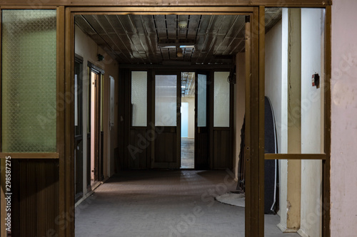 Fotografija Long dark corridor in an old industrial building