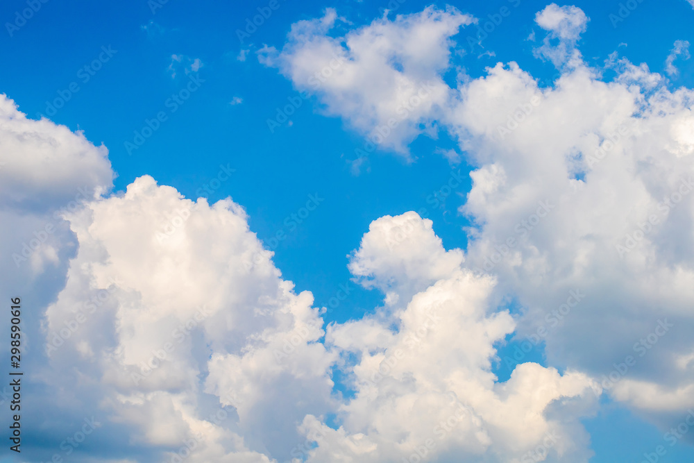 The view of blue sky and white clouds in the natural light of the sunny day. The view of blue sky and white clouds in the natural light of the sunny day.