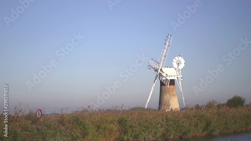 St Benet's Level Drainage Mill on the river Thurne, Norfolk Broads, UK photo