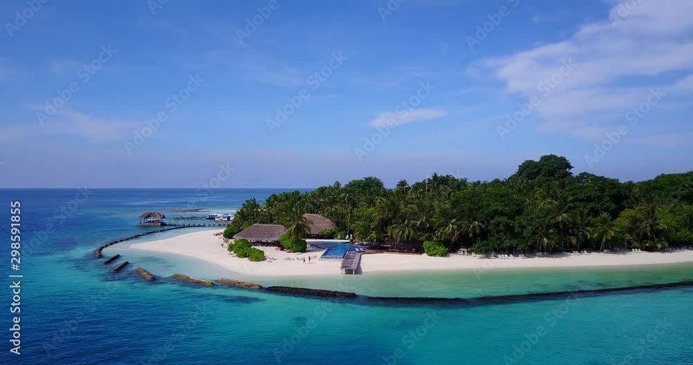 Luxury island resort on the exotic white sand beach in Bahamas - Aerial shot Luxury island resort on the exotic white sand beach in Bahamas - Aerial shot